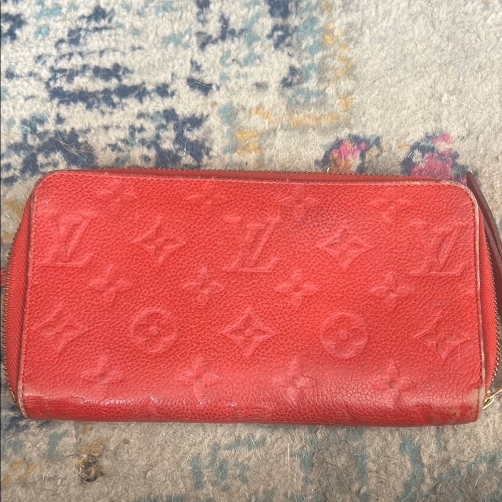 Louis Vuitton Red Leather Wallet with Monogram Pattern